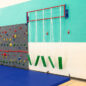 Retractable for easy storage behind the mats.