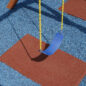 Redwood Rubberific Mat on Blue Rubber Mulch